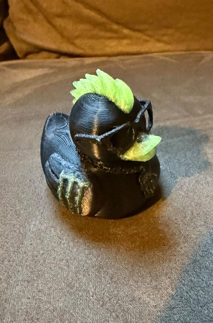 Punk rock duck with a green mohawk